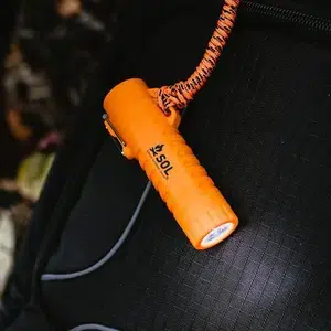 Fire_Lite_Fuel_Free_Lighter_on_backpack_with_flashlight_on