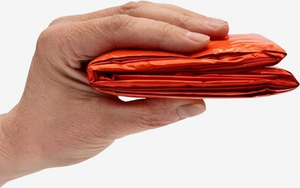 Heat_Reflective_Poncho_folded_in_hand