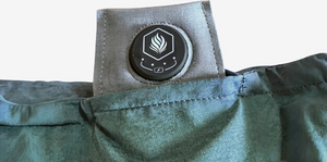 Magic pillow green button