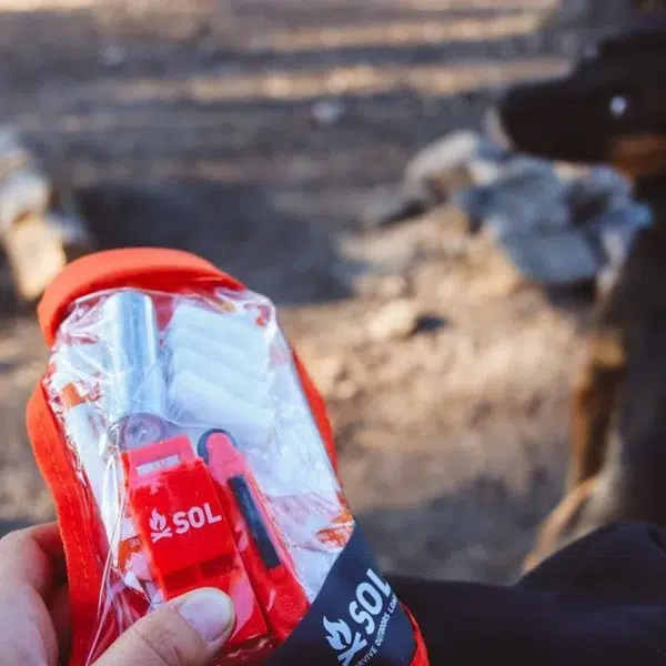 Scout_Survival_Kit_in_hand_near_dog